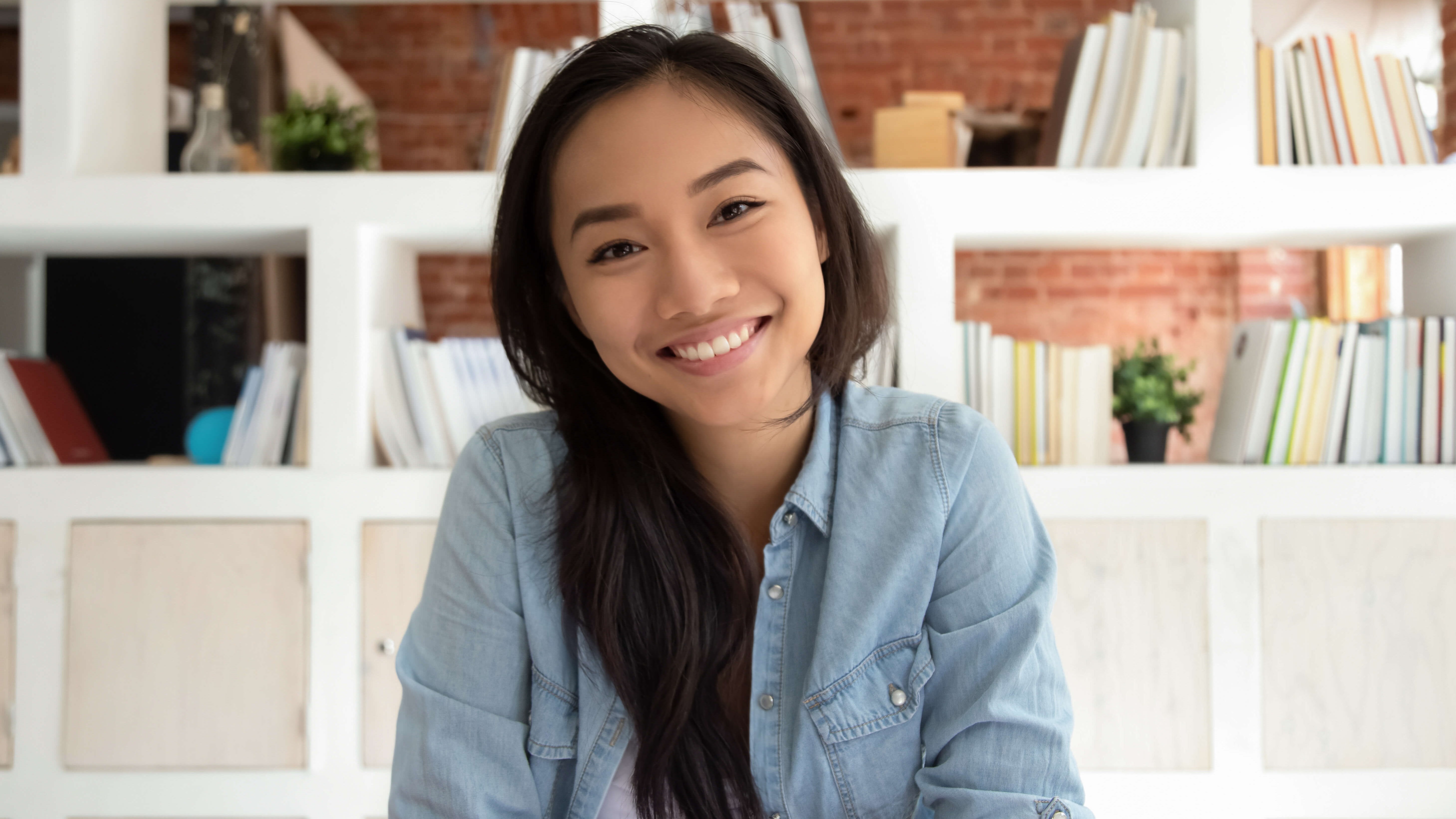 woman sitting and smiling